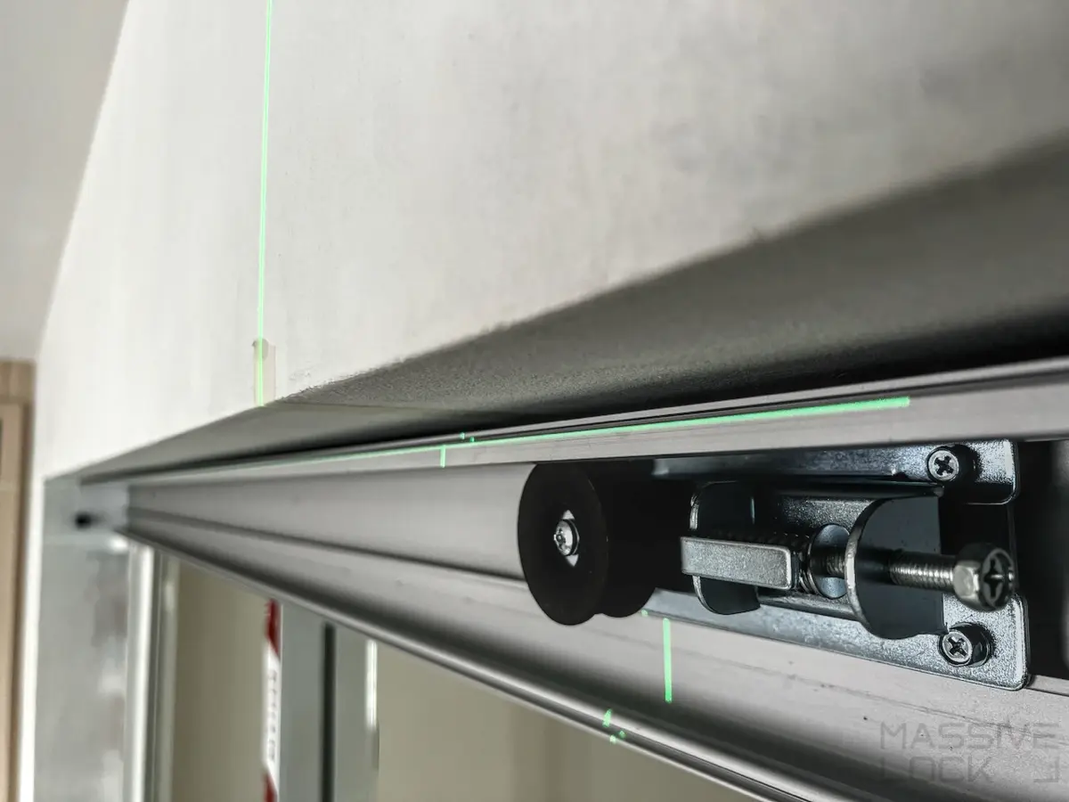 Adjusting the auto door track bit by bit for a precise fit